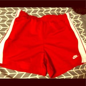 Red Nike shorts